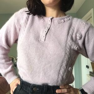 Adorable, soft, rose colored sweater with roses